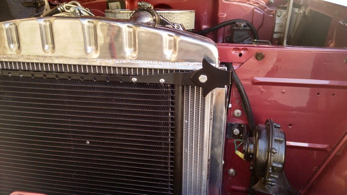 1957 Chevy inside shows right side mount of radiator