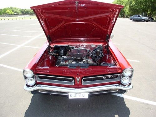 1965 pontiac gto, front view, hood open, engine visible