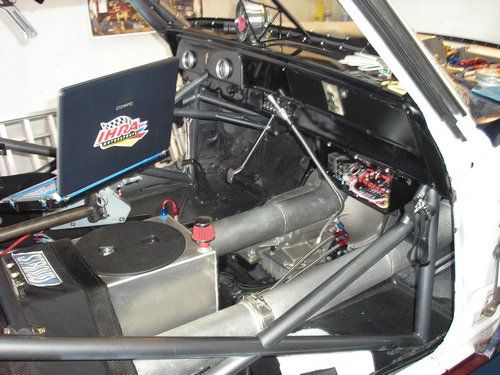Outlaw 1966 Nova, inside of car showing laptop and cooling chamber.