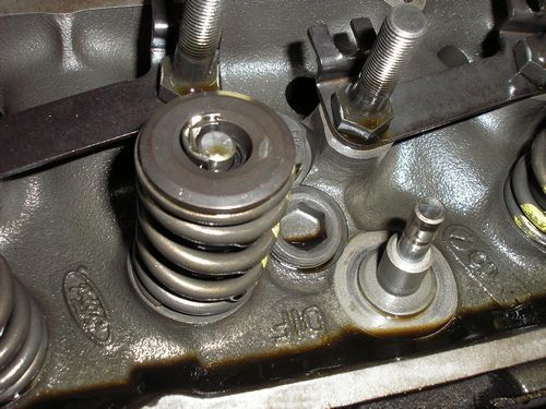 damaged valve keeper and valve stem, engine head, 1966 shelby cobra