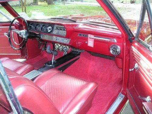 1965 pontiac gto, inside front seat and dash from passenger side