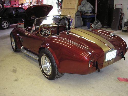 driver rear quarter view, 1966 shelby cobra, open hood